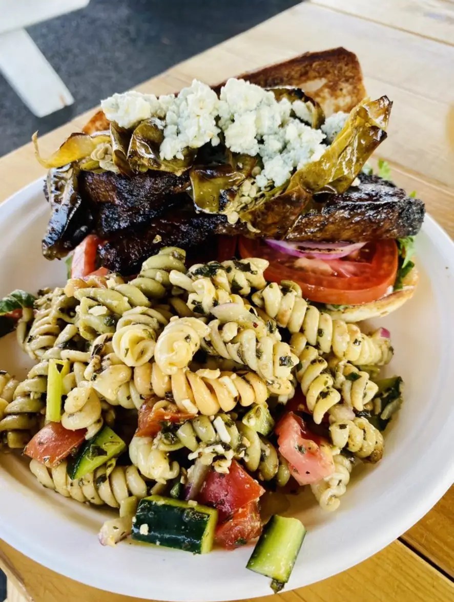 Tri-tip sandwich with blue cheese and pesto pasta salad