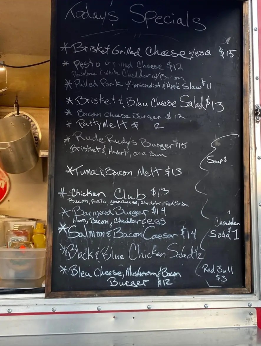 Today's specials chalkboard on the Curbside Bistro truck
